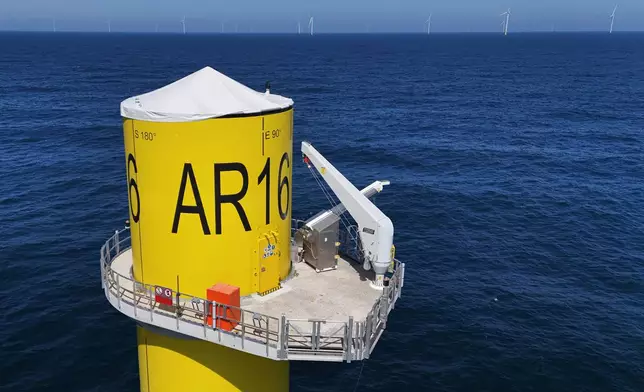A wind turbine base is visible at Sunrise Wind offshore wind farm that is under construction off the coast of Montauk Point, New York, Thursday, April 23, 2026. (AP Photo/Joshua A. Bickel)