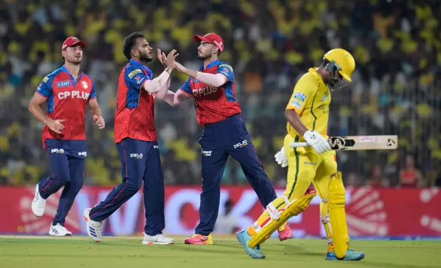 Punjab Kings' Vijaykumar Vyshak celebrates the wicket of Chennai Super Kings' Ayush Mhatre, right, with teammates during the Indian Premier League cricket match between Chennai Super Kings and Punjab Kings in Chennai, India, Friday, April 3, 2026. (AP Photo/Aijaz Rahi)