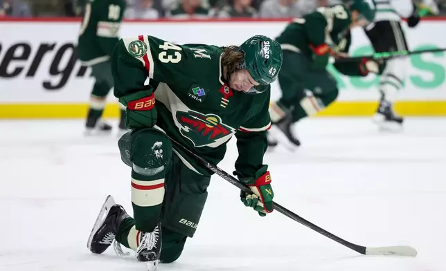 Minnesota Wild defenseman Quinn Hughes (43) reacts during the second period of Game 4 in the first round of the NHL Stanley Cup hockey playoffs against the Dallas Stars, Saturday, April 25, 2026, in St. Paul, Minn. (AP Photo/Matt Krohn)