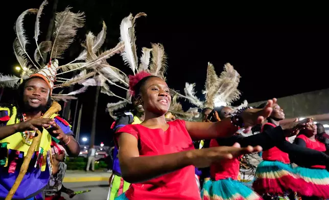 Traditional dancers perform to welcome Sabastian Sawe after he arrived on a plane from London, Wednesday, April 29, 2026, at Jomo Kenyatta International Airport in Nairobi, Kenya, after breaking the marathon world record (AP Photo/Brian Inganga) CORRECTION: Corrects spelling of first name to Sabastian, not Sebastian