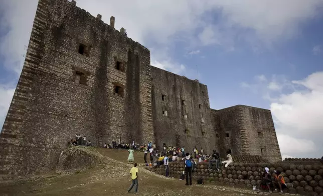 FILE - Visitors tour the Citadelle Laferriere in Milot, Haiti, Thursday, March 27, 2008. (AP Photo/Ariana Cubillos, FILE)