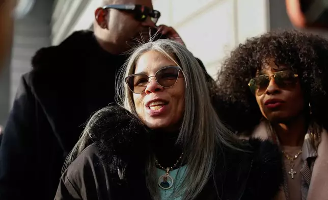 FILE - Gretchen Soto, the mother of Eric Duprey, speaks outside the Bronx Criminal Court in New York, Feb. 6, 2026, after New York police officer Erik Duran was convicted of manslaughter after he tossed a picnic cooler filled with drinks at a fleeing Duprey, causing him to fatally crash his motorized scooter. (AP Photo/Kena Betancur, File)