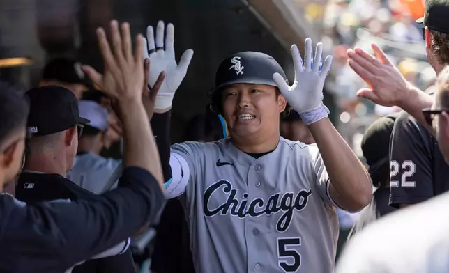 Chicago White Sox's Munetaka Murakami (5) celebrates after hitting a home run during the seventh inning of a baseball game against the Athletics, Saturday, April 18, 2026, in West Sacramento, Calif. (AP Photo/Sara Nevis)