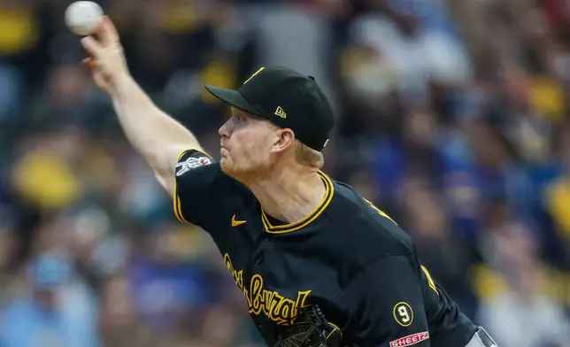 Pittsburgh Pirates pitcher Mitch Keller throws to the Milwaukee Brewers during the first inning of a baseball game Saturday, April 25, 2026, in Milwaukee. (AP Photo/Jeffrey Phelps)