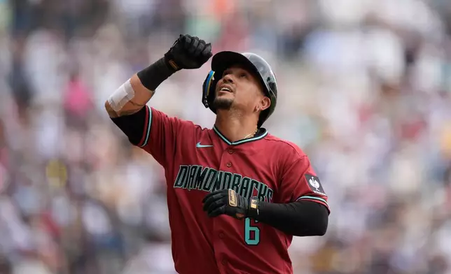 Arizona Diamondbacks' Ildemaro Vargas celebrates after hitting a home run against the San Diego Padres during the sixth inning of a baseball game in Mexico City, Sunday, April 26, 2026. (AP Photo/Fernando Llano)