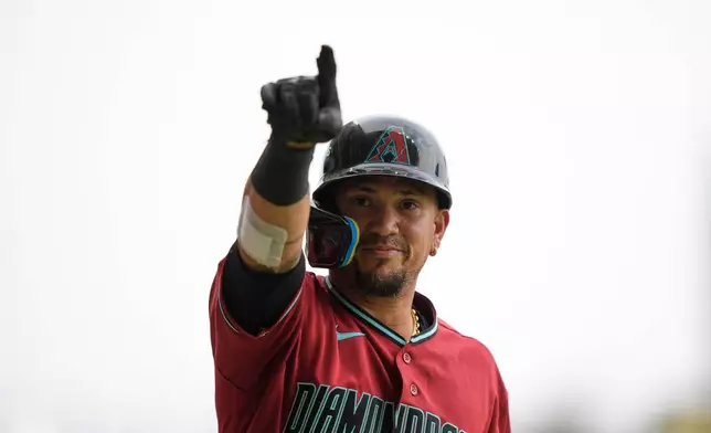 Arizona Diamondbacks' Ildemaro Vargas celebrates after hitting a home run against the San Diego Padres during the sixth inning of a baseball game in Mexico City, Sunday, April 26, 2026. (AP Photo/Fernando Llano)