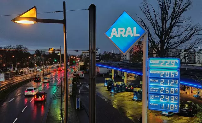 Fuel prices are listed at a gas station in Frankfurt, Germany, Monday, March 30, 2026. (AP Photo/Michael Probst)