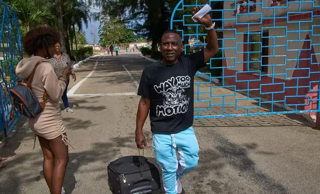 A pardoned prisoner walks out of La Lima penitentiary after his release in Guanabo, Cuba, Friday, April 3, 2026. (AP Photo/Ramon Espinosa)