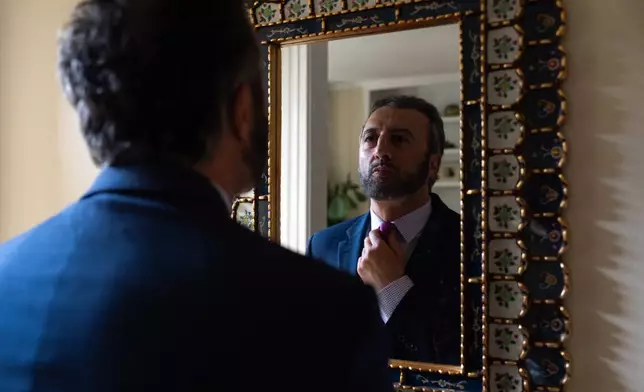 Alireza Nader poses for a portrait, March 31, 2026, in Washington. (AP Photo/Julia Demaree Nikhinson)