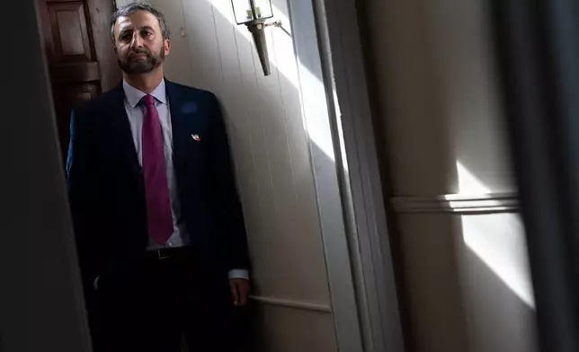 Alireza Nader poses for a portrait, March 31, 2026, in Washington. (AP Photo/Julia Demaree Nikhinson)