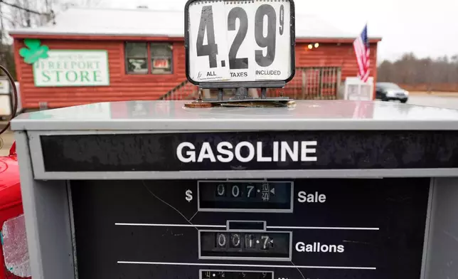 A sign shows the price of gas at a store, Tuesday, March 31, 2026, in Freeport, Maine. (AP Photo/Robert F. Bukaty)