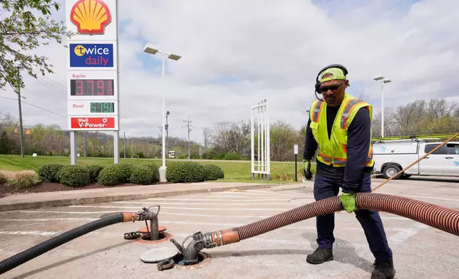 Fuel transport truck driver Terry Bowden refills at a gas station, Monday, March 30, 2026, in Nashville, Tenn. (AP Photo/George Walker IV)