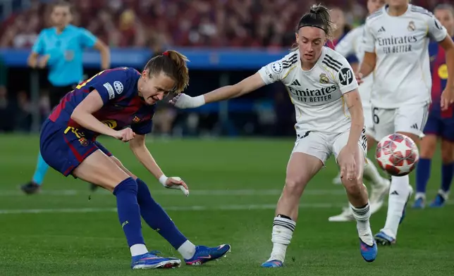 Barcelona's Graham Hansen scores her side's fifth goal during a Champions League quarterfinal soccer match between Barcelona and Real Madrid, in Barcelona, Spain, Thursday, April 2 2026. (AP Photo/Joan Monfort)