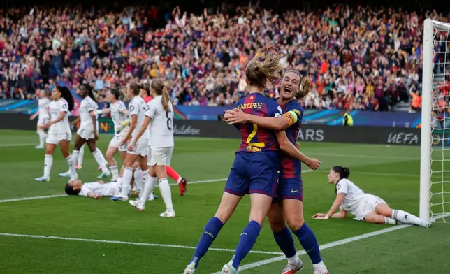 Barcelona's Irene Paredes celebrates after scoring her side's third goal during a Champions League quarterfinal soccer match between Barcelona and Real Madrid, in Barcelona, Spain, Thursday, April 2 2026. (AP Photo/Joan Monfort)