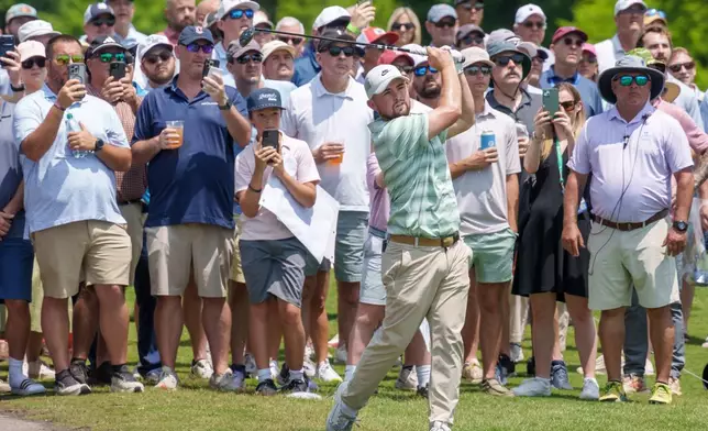 Alex Fitzpatrick, of England, hits a second shot on the second hole during the final round of the PGA Zurich Classic of New Orleans golf tournament, Sunday, April 26, 2026, in Avondale, La. (AP Photo/Matthew Hinton)