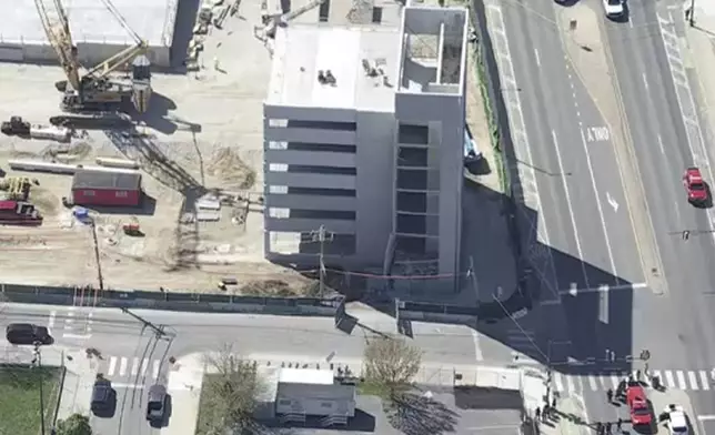 Damage is seen to a parking garage under construction after it collapsed on Wednesday, April 8, 2026, in Philadelphia. (WPVI-TV/6ABC via AP)
