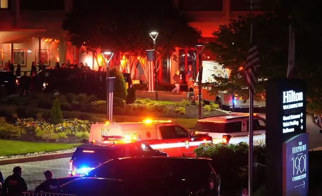Law enforcement respond to an incident at the Washington Hilton during the White House Correspondents Dinner, Saturday, April 25, 2026, in Washington. (AP Photo/Allison Robbert)