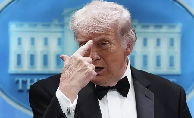 President Donald Trump gestures as he speaks in the James Brady Press Briefing Room at the White House after an unspecified threat at the annual White House Correspondents' Association Dinner in Washington, Saturday, April 25, 2026. (AP Photo/Jose Luis Magana)