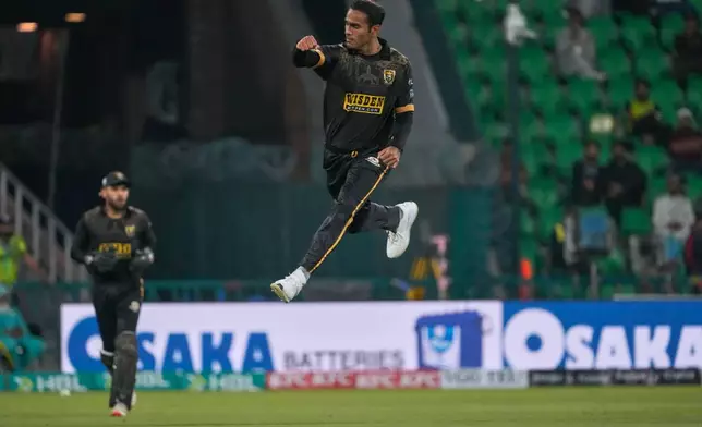 Hyderabad Kingsmen Mohammad Ali, center, celebrates after taking wicket during the Pakistan Super League first eliminator cricket match between Multan Sultans and Hyderabad Kingsmen at the Gaddafi Stadium in Lahore, Pakistan, Wednesday, April 29, 2026. (AP Photo/K.M. Chaudary)