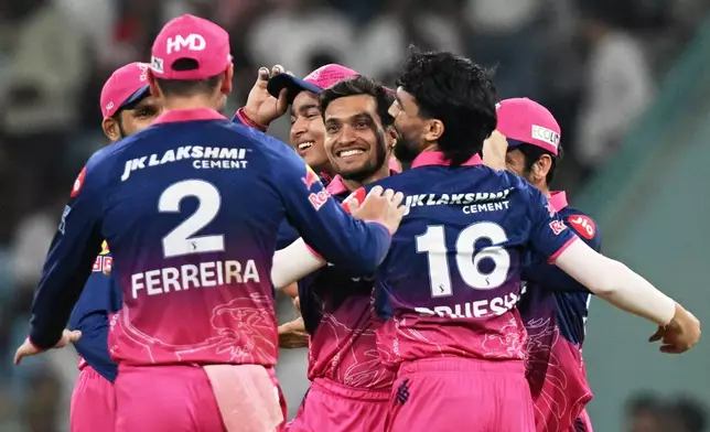 Rajasthan Royals' Ravi Singh, center, celebrates with teammates after running out Lucknow Super Giants' Ayush Badoni during the Indian Premier League cricket match between Lucknow Super Giants and Rajasthan Royals in Lucknow, India, Wednesday, April 22, 2026. (AP Photo)
