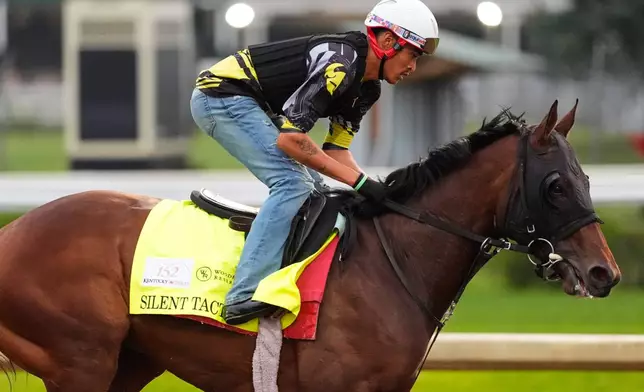 Kentucky Derby entrant Silent Tactic works out at Churchill Downs Tuesday, April 28, 2026, in Louisville, Ky. (AP Photo/Charlie Riedel)