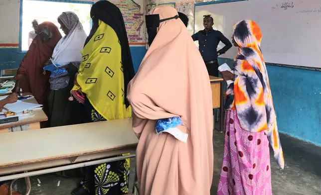 Women cast their votes at a polling station during the Djibouti presidential elections in Mouloud, Djibouti, Friday, April 10, 2026. (AP Photo/Guirreh Moumin)