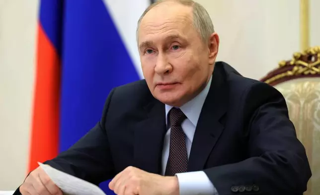 FILE - Russian President Vladimir Putin holds a videoconference cabinet meeting at the Kremlin in Moscow, Thursday, April 23, 2026. (Alexander Kazakov/Sputnik, Kremlin Pool Photo via AP, File)
