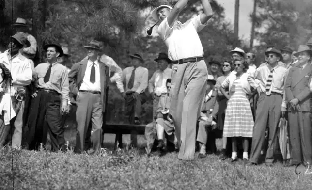 FILE - Herman Keiser drives from the third tee at the Masters golf touranment at Augusta National Golf Club on April 4, 1946, in Augusta, Ga. (AP Photo/File)