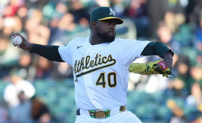 Athletics pitcher Luis Severino throws to a Texas Rangers batter during the first inning of a baseball game Monday, April 13, 2026, in West Sacramento, Calif. (AP Photo/Scott Marshall)