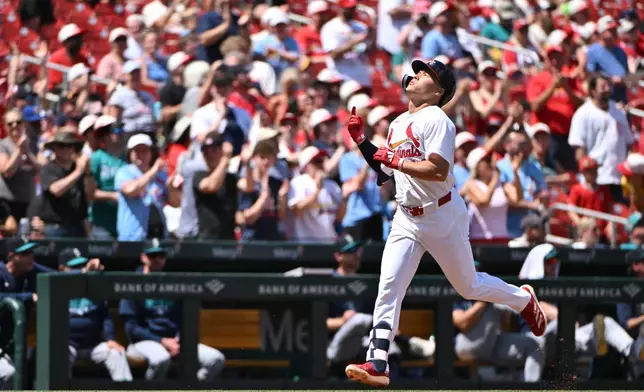 St. Louis Cardinals' JJ Wetherholt reacts after hitting a home run against the Seattle Mariners during the third inning of a baseball game, Sunday, April 26, 2026, in St. Louis. (AP Photo/Jeff Le)