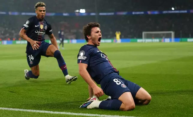 PSG's Joao Neves celebrates after scoring his side's second goal during a Champions League semifinal, first leg, soccer match between Paris Saint-Germain and Bayern Munich in Paris, Tuesday, April 28, 2026. (AP Photo/Aurelien Morissard)