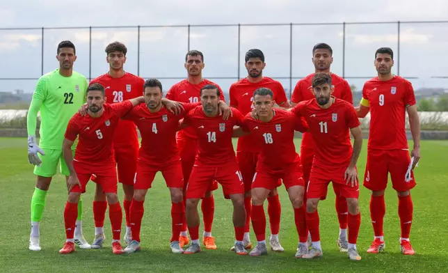 Iran's players pose for photographer prior a friendly soccer match between Iran and Costa Rica, in Antalya, southern Turkey, Tuesday, March 31, 2026. (AP Photo/Riza Ozel)
