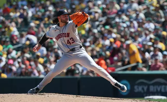 Houston Astros pitcher Lance McCullers Jr. throws to the Athletics during the second inning of a baseball game, Sunday, April 5, 2026, in West Sacramento, Calif. (AP Photo/Sara Nevis)