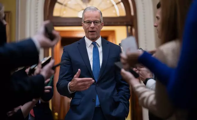 Senate Majority Leader John Thune, R-S.D., speaks to reporters outside the chamber after passing a measure by unanimous consent that would fund most of the Department of Homeland Security, if the House agrees, at the Capitol in Washington, Thursday, April 2, 2026. (AP Photo/J. Scott Applewhite)