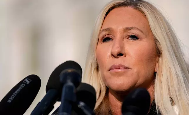 FILE - Rep. Marjorie Taylor Greene, R-Ga., speaks during a news conference on the Epstein Files Transparency Act, Nov. 18, 2025, outside the U.S. Capitol in Washington. (AP Photo/Julia Demaree Nikhinson, File)