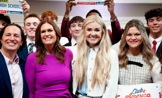 FILE - Gov. Sarah Huckabee Sanders, center left, and Turning Point CEO Erika Kirk, center right, pose for a photo at the Governor's Mansion, in Little Rock, Ark., Wednesday, March 11, 2026. (AP Photo/Katie Adkins,File)