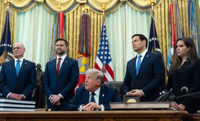 From left, Israeli Ambassador to the U.S. Yechiel Leiter, Vice President JD Vance, Secretary of State Marco Rubio, and Lebanese Ambassador to the U.S. Nada Hamadeh Moawad, listen to President Donald Trump speak in the Oval Office at the White House, Thursday, April 23, 2026, in Washington. (AP Photo/Mark Schiefelbein)