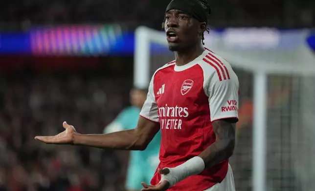 Arsenal's Noni Madueke reacts during the UEFA Champions League second leg quarterfinal soccer match between Arsenal and Sporting in London, England, Wednesday, April 15, 2026. (AP Photo/Kin Cheung)