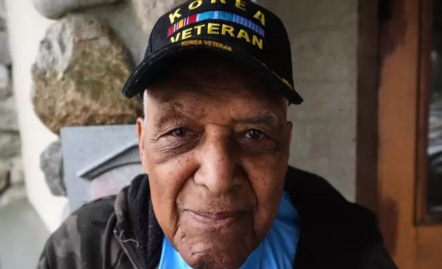 Revolutionary War re-enactor Charles Price, 95, who for decades portrayed enslaved Minuteman Prince Estabrook, poses for a portrait near the village green, Monday, April 13, 2026, in Lexington, Mass. (AP Photo/Charles Krupa)