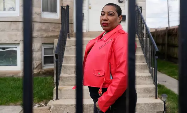 Asiaha Butler, the co-founder of the Resident Association of Greater Englewood, poses for a photo outside her office in Chicago, Monday, April 6, 2026. (AP Photo/Nam Y. Huh)