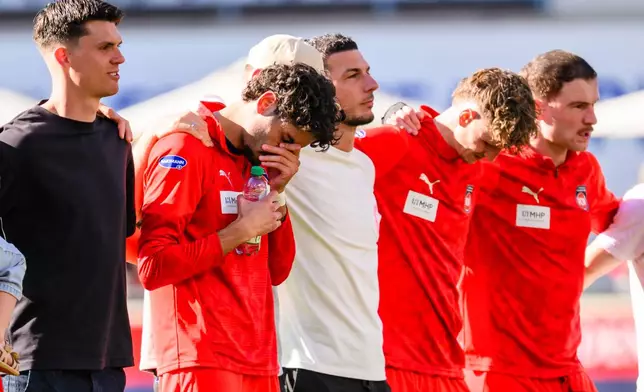 Heidenheim player Eren Dinkçi reacts after the German Bundesliga soccer match between 1. FC Heidenheim and 1. FC St. Pauli in Heidenheim, Germany, on Saturday, April 25, 2026. (Tom Weller/dpa via AP)