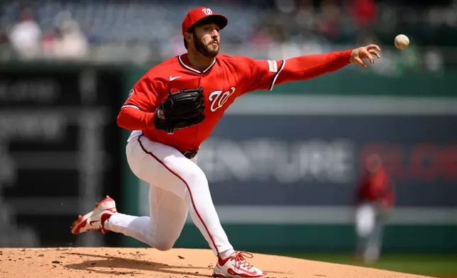 Washington Nationals starting pitcher PJ Poulin throws during the first inning of a baseball game against the San Francisco Giants, Sunday, April 19, 2026, in Washington. (AP Photo/Nick Wass)