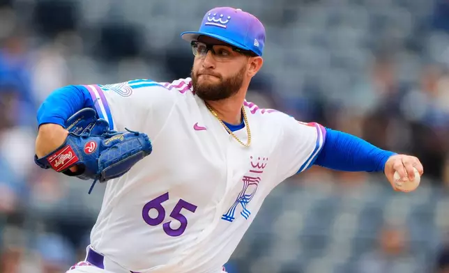 Kansas City Royals starting pitcher Noah Cameron throws during the first inning of a baseball game against the Chicago White Sox, Sunday, April 12, 2026, in Kansas City, Mo. (AP Photo/Charlie Riedel)