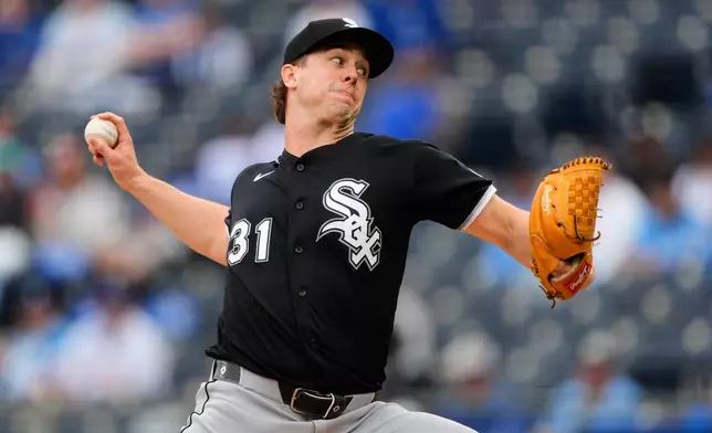 Chicago White Sox starting pitcher Grant Taylor throws during the first inning of a baseball game against the Chicago White Sox, Sunday, April 12, 2026, in Kansas City, Mo. (AP Photo/Charlie Riedel)