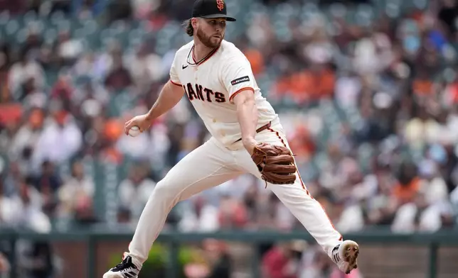 San Francisco Giants pitcher Landen Roupp throws against the Miami Marlins during the first inning of a baseball game Sunday, April 26, 2026, in San Francisco. (AP Photo/Jeff Chiu)