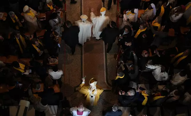 Pope Leo XIV arrives to celebrate a Mass in the Saint Augustine Basilica in Annaba, Algeria, Tuesday, April 14, 2026, on the second day of an 11-day apostolic journey to Africa. (AP Photo/Andrew Medichini)