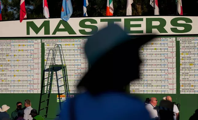 Patrons arrive for the second round of the Masters golf tournament at the Augusta National Golf Club, Friday, April 10, 2026, in Augusta, Ga. (AP Photo/Ashley Landis)