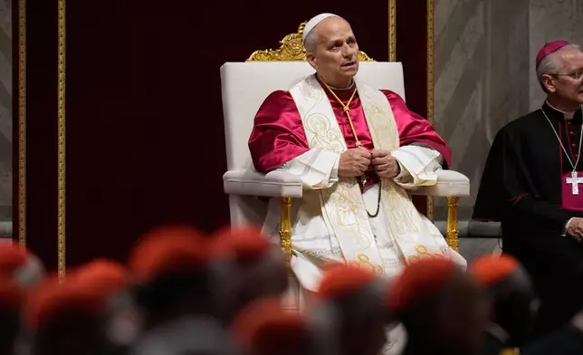 Pope Leo XIV leads a vigil for peace inside St. Peter's Basilica at the Vatican, Saturday, April 11, 2026. (AP Photo/Gregorio Borgia)