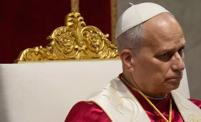 Pope Leo XIV leads a vigil for peace inside St. Peter's Basilica at the Vatican, Saturday, April 11, 2026. (AP Photo/Gregorio Borgia)