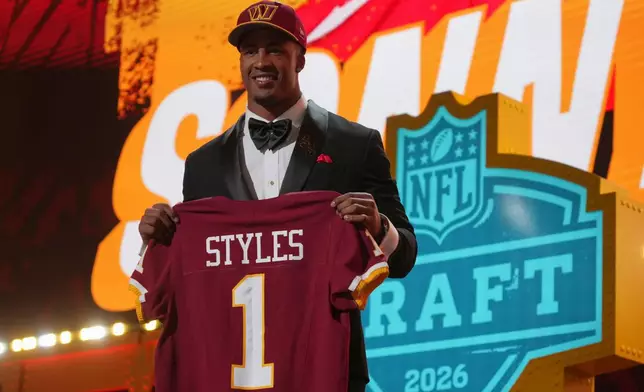 Ohio State linebacker Sonny Styles poses after being chosen by the Washington Commanders with the seventh overall pick during the first round of the NFL football draft, Thursday, April 23, 2026, in Pittsburgh. (AP Photo/Gene J. Puskar)